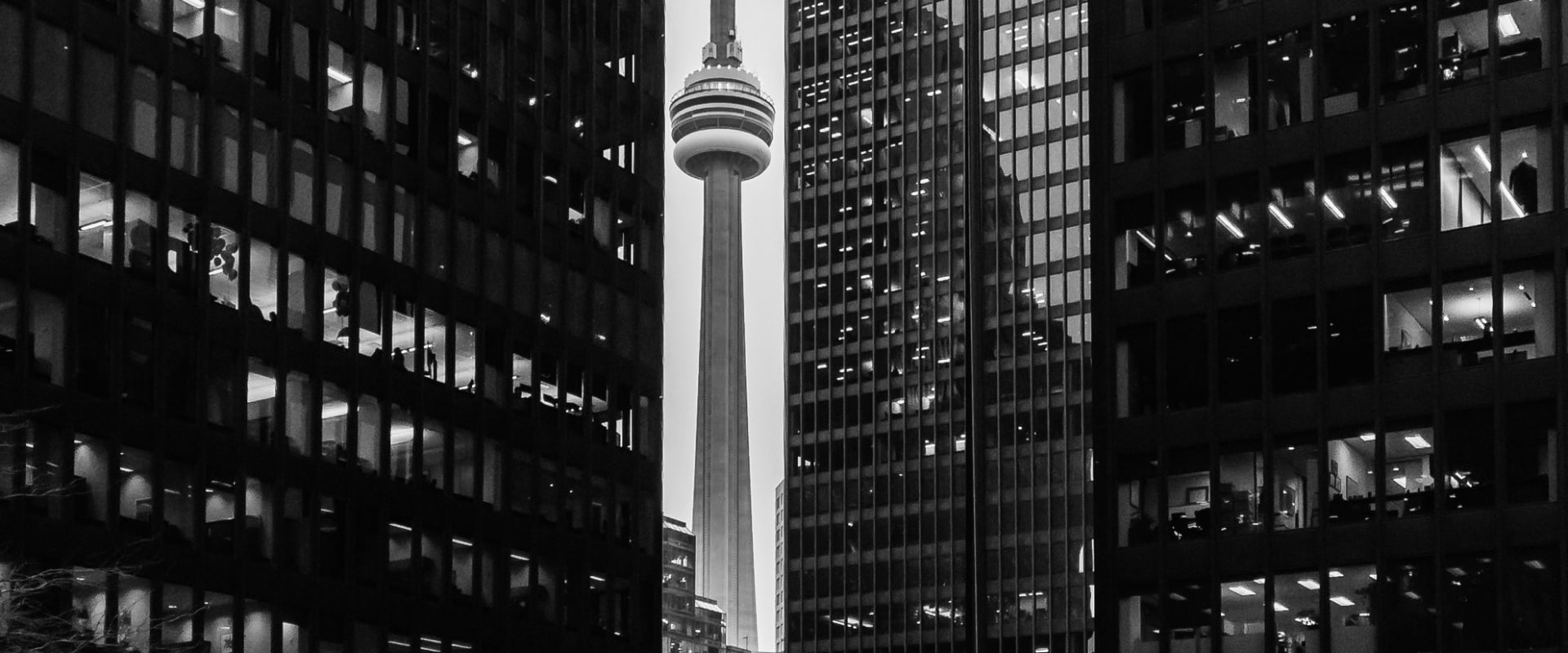 Toronto skyline with the CN Tower framed between downtown office towers